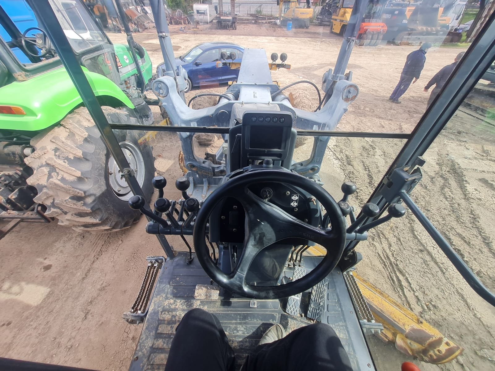 Motoniveladora John Deere 670 G 2012 con 11.500 hs